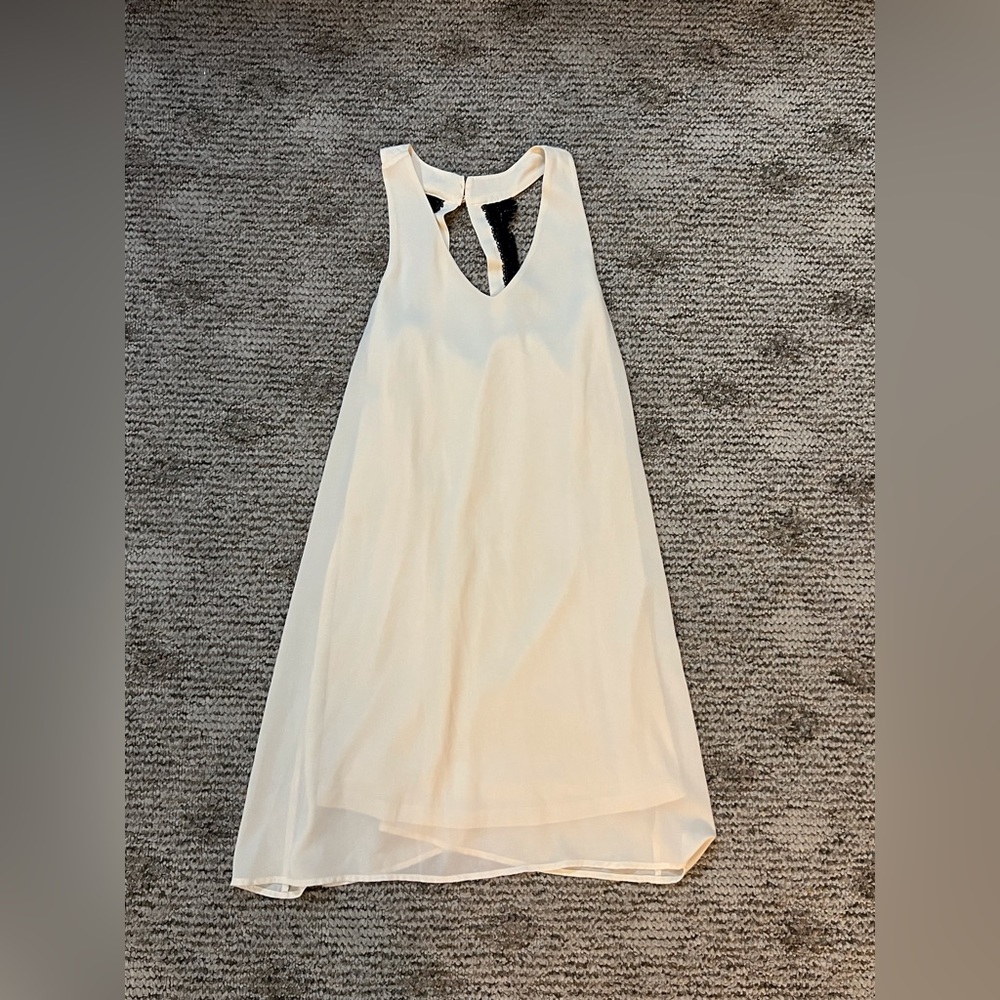 Offwhite dress with black lace